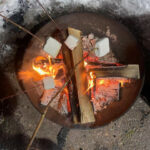 the-cranberry-over-superior-dining-roasting-marshmellows-over-a camp-fire